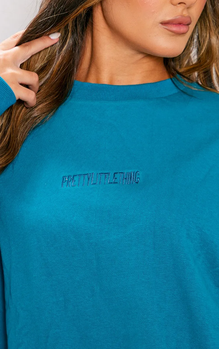 PRETTYLITTLETHING Sweat bleu brodé à ourlets froncés