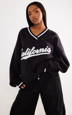 Sweat noir à col en V et slogan California style universitaire